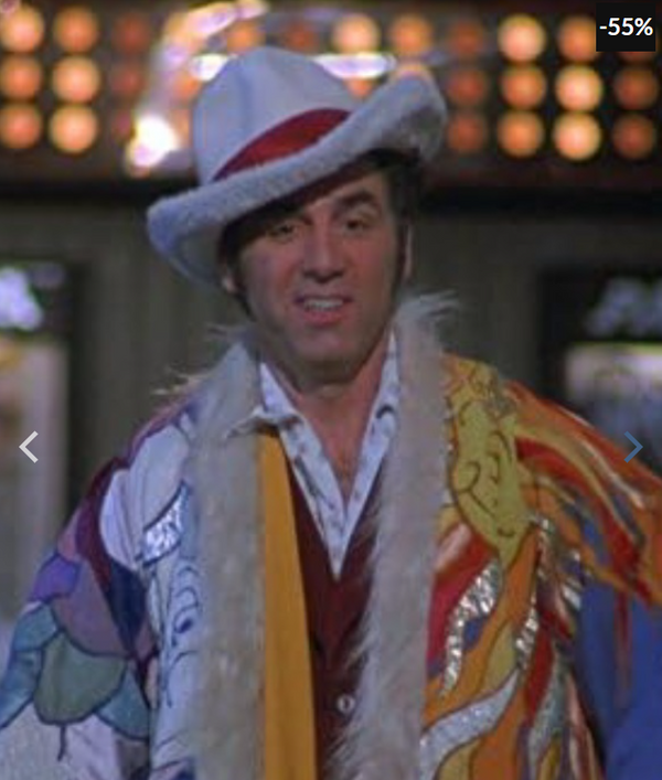 Men's multicolor patchwork coat with white fur trim and colorful design