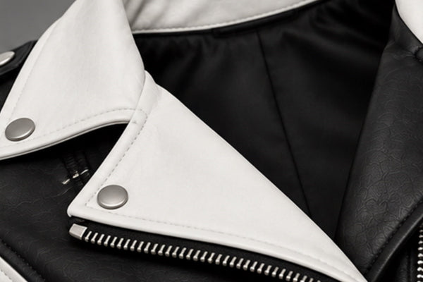 Women’s black and white leather biker jacket lapel collar details